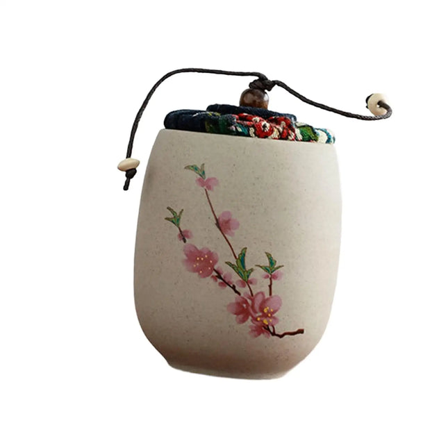 Artisanal Hand-Painted Ceramic Tea Caddy with Fabric Seal
